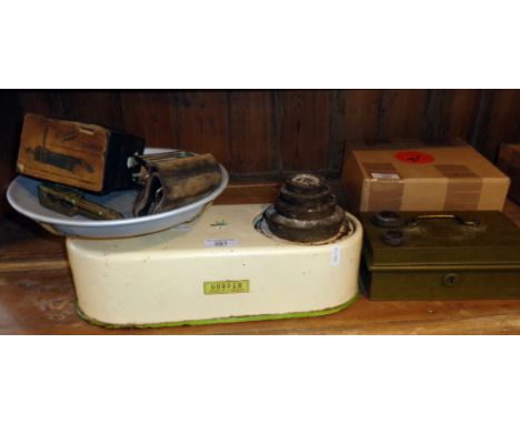 Pre-war Harper enamel kitchen scales and weight, an Ogee razor strop in box, a cash tin and a pair of nutcrackers