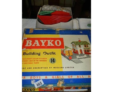 A Bayko building outfit No, 14 and a box of parts, completion unknown. 
