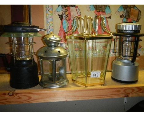 A candle lantern, two other lanterns and a lamp shade. (Collect only) 