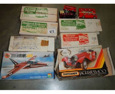 Five Hadfield Blackpool tram plastic model kits, an Airfix Red Arrow and a Jaguar par built SS100. 