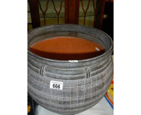 A large good quality garden planter.  (collect only) 