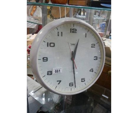 A Smith's Astral quartz wall clock. 
