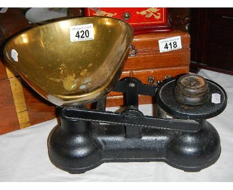 A set of vintage kitchen scales with brass pan. 