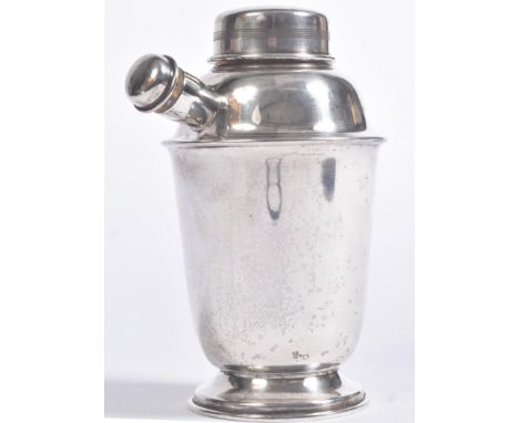 A vintage 20th Century Art Deco 1930s silver plated cocktail drinks shaker of tapering form raised on a circular foot&nbsp; w