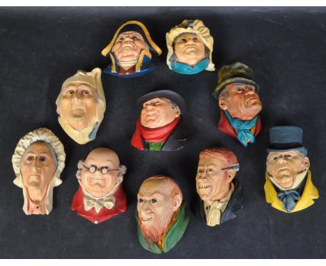 A collection of vintage late 20th century circa 1980s Bossons Congleton England plaster Charles Dickens character wall hangin