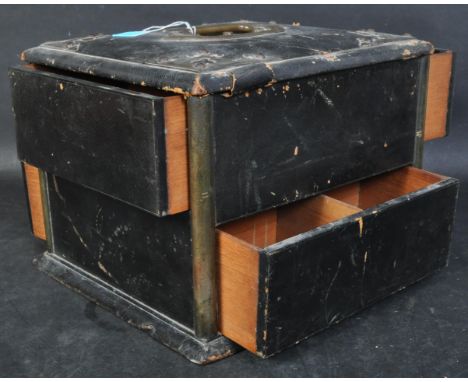 A 19th century Victorian leather and brass bound articulated travel puzzle jewellery / deed box trunk. Of square form bound i