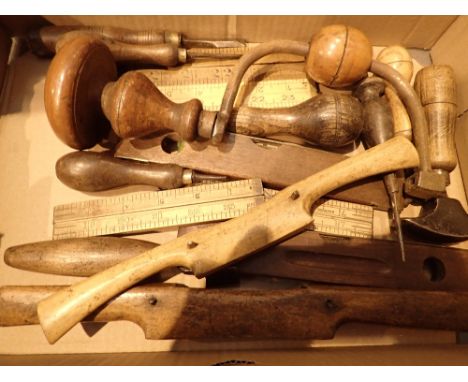 Collection of vintage tools including leather working examples