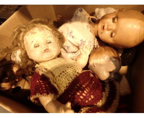 Box of mixed vintage dolls including ceramic headed examples with some clothing all A/F