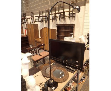 Floor standing adjustable reading lamp