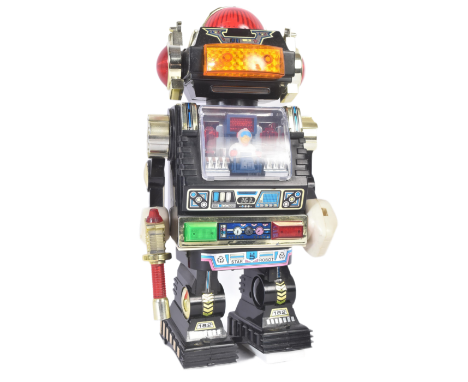 A vintage 1980s (1985) made in Taiwan battery operated ' Star Robot ' with 360 degree revolving body, lights and sounds. Unte