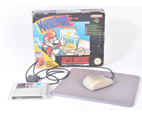 Retro Gaming - a vintage 1990s (1992) Super Nintendo video game ' Mario Paint ' package with NES mouse and mouse pad. Housed 