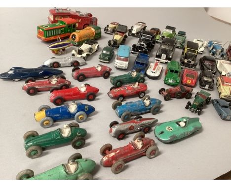 Large selection Of Vintage Diecast toy vehicles to include Dinky racing cars across the years , Brimtoy and many vintage make