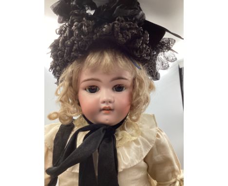 Antique Simon and Halbig 1079 23” bisque head character doll.Head stamped as shown with additional retailers red stamp from G
