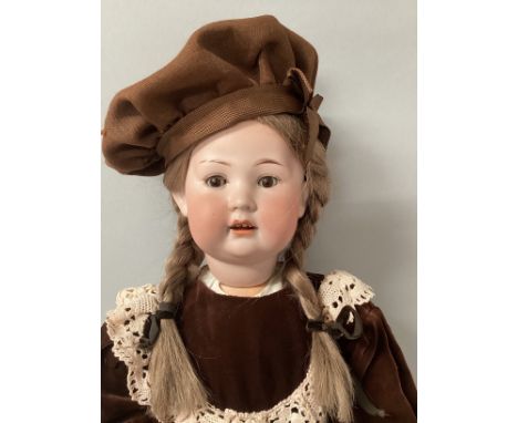 Antique PM 924 Bisque head tall standing child doll in brown velvet dress set with beret and plaited hair wig . 25”  924 tall