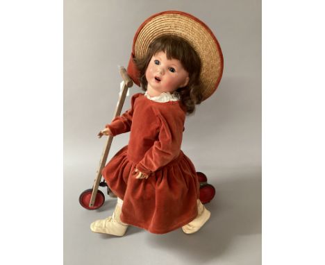 Antique 1930s Likely UNIS composition standing Mannequin dolly 28” with hair wig and velvet clothes and a wooden scooter toy.