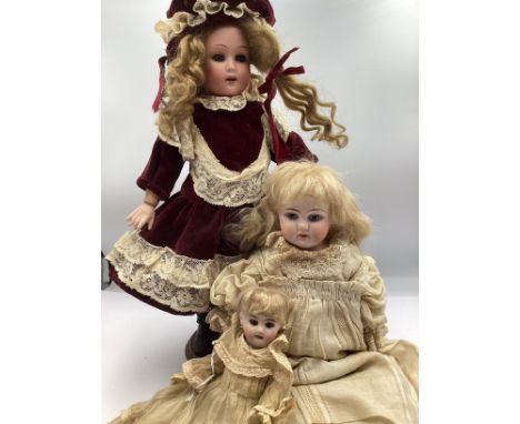 Antique dolls x 3 to include ; blonde bisque doll marked 7 open close eyes, carton comp body and original organdie dress and 