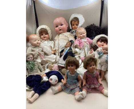 Antique and Vintage dolls ; to include composition, and artist black bru( eyes have dropped through ) many vintage baby dolls