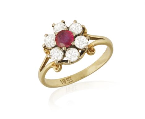 A RUBY AND DIAMOND CLUSTER RING, centring a circular-cut ruby within a brilliant-cut diamond surround, mounted in 18K gold, r