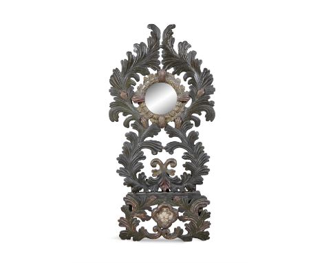 A CONTINENTAL 19TH CENTURY CARVED, PARCEL GILT AND PAINTED TIMBER WALL BRACKET OF ELONGATED FORM and with an incorporated she