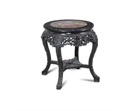 A CHINESE PADOUK AND ROUGE MARBLE JARDINIERE STAND, Late Qing Dynasty,of circular form, with solid platform top and pierced a