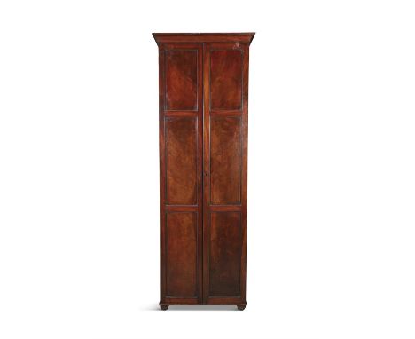 AN UNUSUAL TALL FLAME MAHOGANY WARDROBEwith twin doors. 222cm high, 72cm wide, 46cm deep*Please note this lot is not on view 