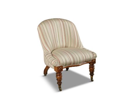 A VICTORIAN MAHOGANY AND UPHOLSTERED BEDROOM CHAIR, C.1850covered in a pale striped fabric on bobbin turned legsCondition Rep