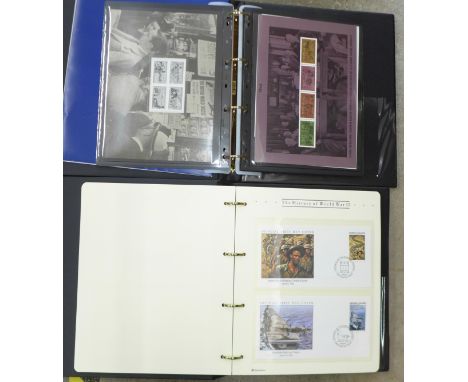 A collection of WWII commemorative first day covers and mint stamps 