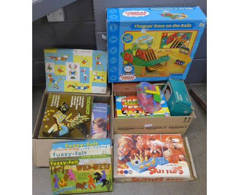 Assorted toys and games including vintage (1970's) and a Thomas the Tank Engine Race on the Rails set **PLEASE NOTE THIS LOT 