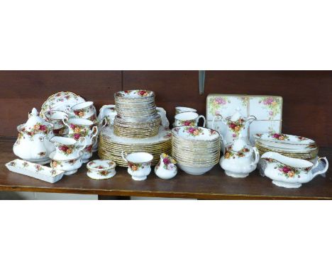 A collection of Royal Albert Old Country Roses tea and dinnerware, 3 trinket pieces, place mats, approximately 80 pieces, 12 