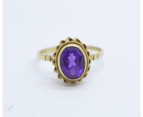 A 9ct gold and amethyst ring, 1.8g, R 
