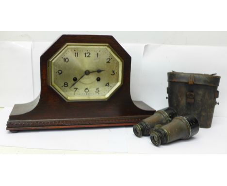 A Cope's of Nottingham chiming mantel clock and a pair of field glasses 