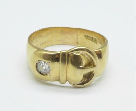 An 18ct gold and diamond buckle ring, 7.9g, R 