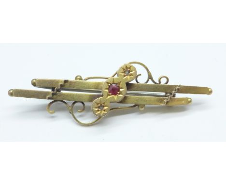 A 9ct gold, ruby and diamond brooch, 2.8g 