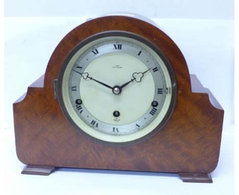 An Elliott mantel clock with chiming movement, the dial marked Cope, Nottingham 