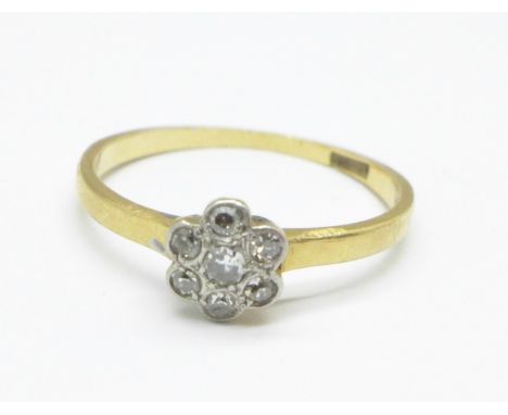 An 18ct gold and diamond cluster ring, 1.9g, K 