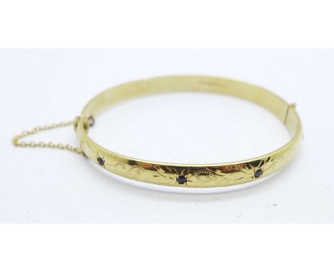 A gold plated bangle 