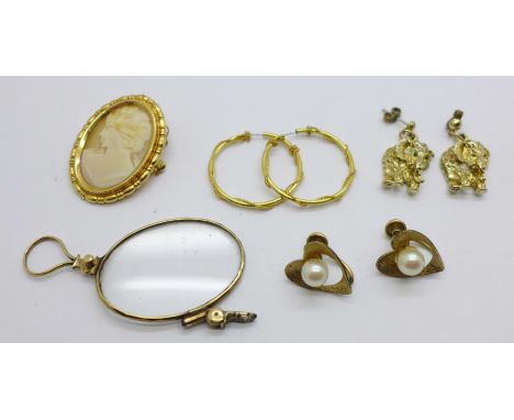 Three pairs of earrings including one pair of novelty elephant earrings, a cameo brooch and a part lorgnette 