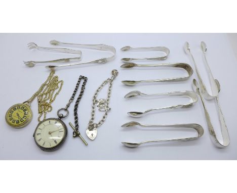 A silver pocket watch, no back, a silver bracelet and silver plated sugar bows 