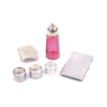 A silver engine turned rectangular cigarette case and other items.