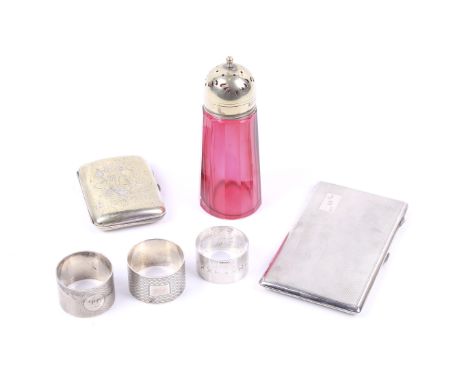A silver engine turned rectangular cigarette case and other items. The cigarette case with a small rectangular reserve with i