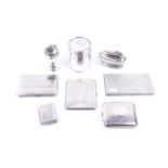 Seven silver smoking related items.