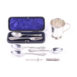 A small collection of silver including an Art Deco silver christening mug.