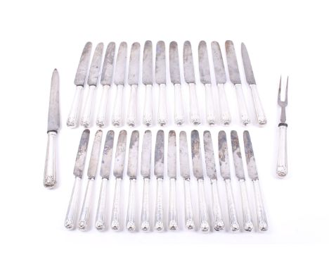 Thirteen George IV and later silver old English shell handled table knives and fourteen dessert knives. Together with a carvi