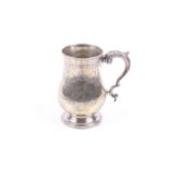 A Victorian silver baluster shaped mug.