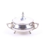 Charles Edwards, a planished-silver round bowl and cover.