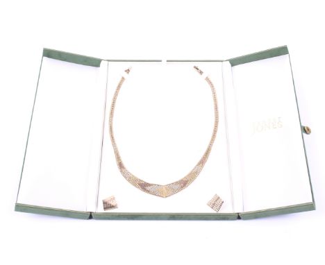 A vintage Italian 9ct tri-colour gold collar and a pair of earrings. The collar with a tapering chevron-shaped frontispiece e