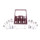 A Victorian Exeter fiddle pattern sugar tongs and various spoons.