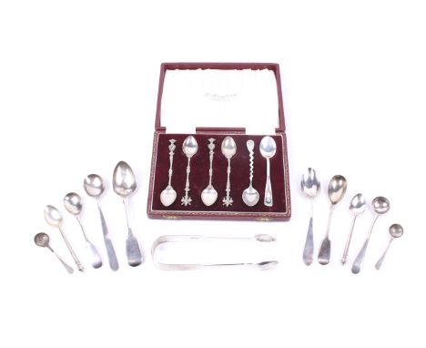A Victorian Exeter fiddle pattern sugar tongs and various spoons. Including two fiddle pattern mustard spoons and a teaspoon;
