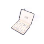 Liberty, a set of six silver and enamel coffee spoons.