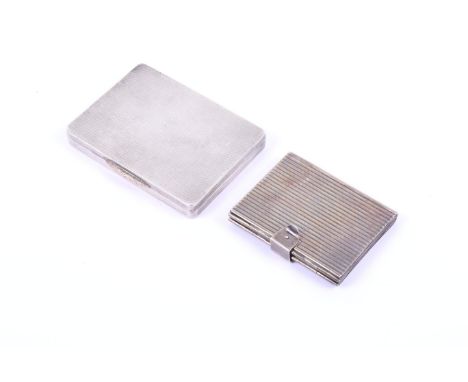 A silver snuff box and a white metal four fold photograph pocket wallet. The snuff box marked William Neale & Son Ltd, Birmin